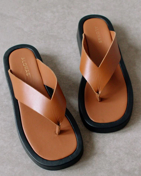 Overcast tan flip flop